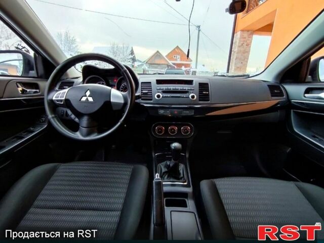 Сірий Міцубісі Lancer, об'ємом двигуна 1.6 л та пробігом 110 тис. км за 7500 $, фото 3 на Automoto.ua