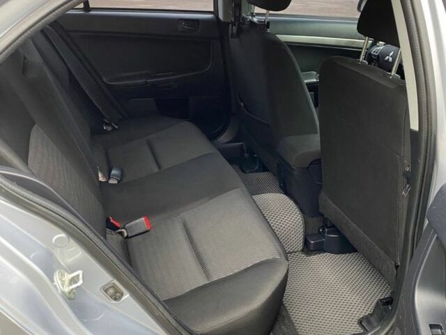 Сірий Міцубісі Lancer, об'ємом двигуна 2 л та пробігом 170 тис. км за 7500 $, фото 14 на Automoto.ua