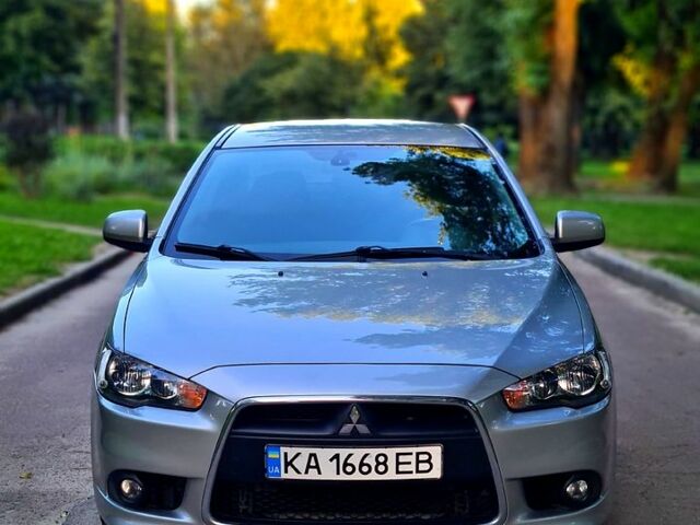 Сірий Міцубісі Lancer, об'ємом двигуна 1.8 л та пробігом 115 тис. км за 8200 $, фото 1 на Automoto.ua