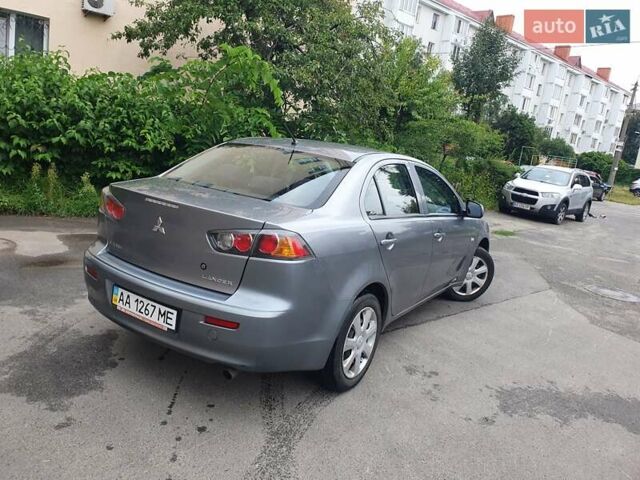 Серый Мицубиси Лансер, объемом двигателя 1.59 л и пробегом 265 тыс. км за 5950 $, фото 8 на Automoto.ua