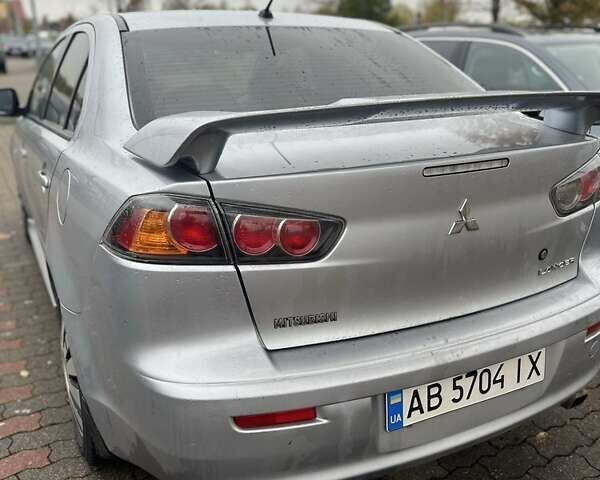 Серый Мицубиси Лансер, объемом двигателя 1.6 л и пробегом 212 тыс. км за 8619 $, фото 1 на Automoto.ua
