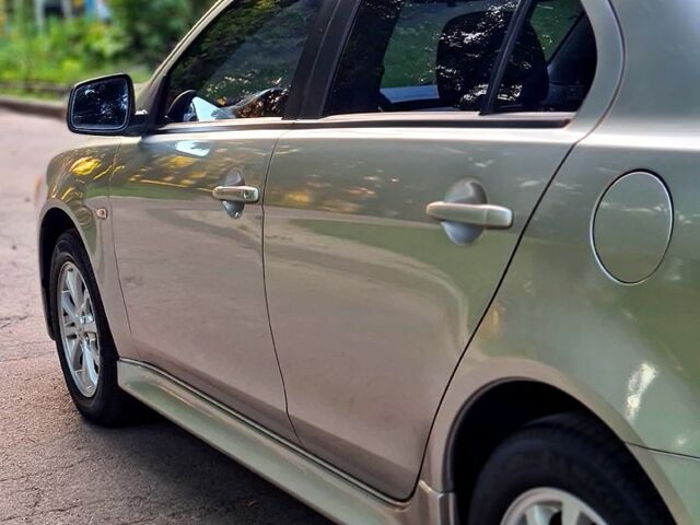 Сірий Міцубісі Lancer, об'ємом двигуна 1.8 л та пробігом 115 тис. км за 8200 $, фото 6 на Automoto.ua