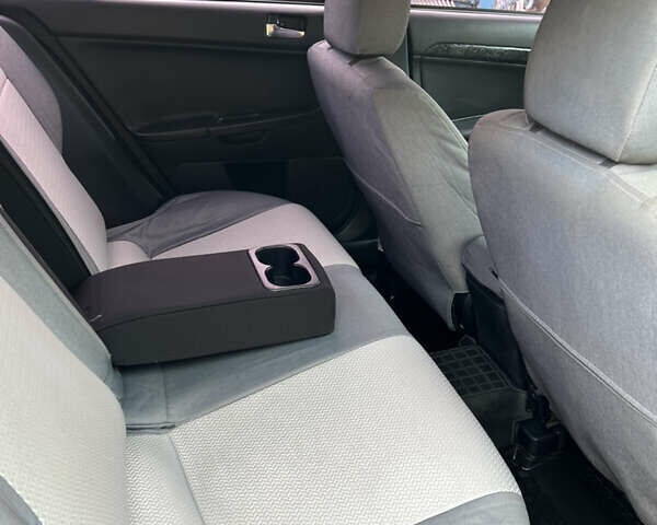 Сірий Міцубісі Lancer, об'ємом двигуна 1.59 л та пробігом 270 тис. км за 5500 $, фото 2 на Automoto.ua