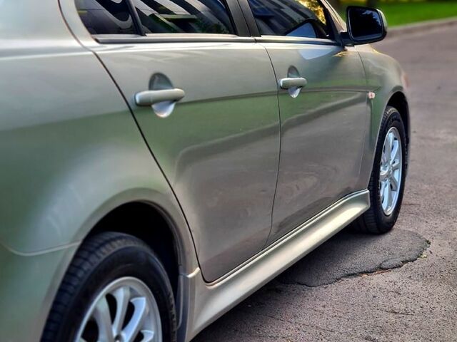 Сірий Міцубісі Lancer, об'ємом двигуна 1.8 л та пробігом 115 тис. км за 8200 $, фото 7 на Automoto.ua