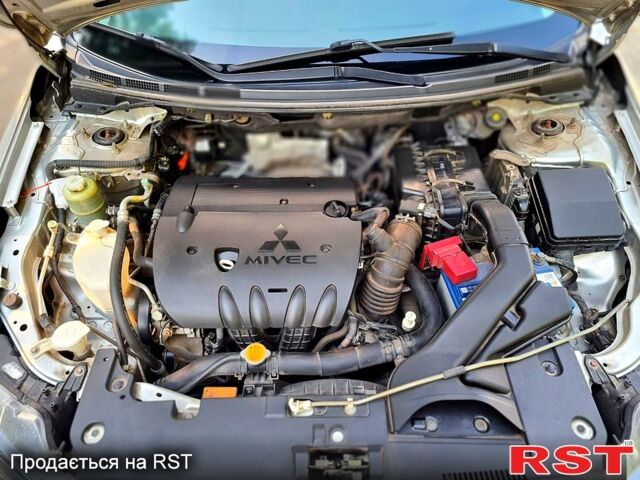 Сірий Міцубісі Lancer, об'ємом двигуна 1.8 л та пробігом 115 тис. км за 8200 $, фото 13 на Automoto.ua