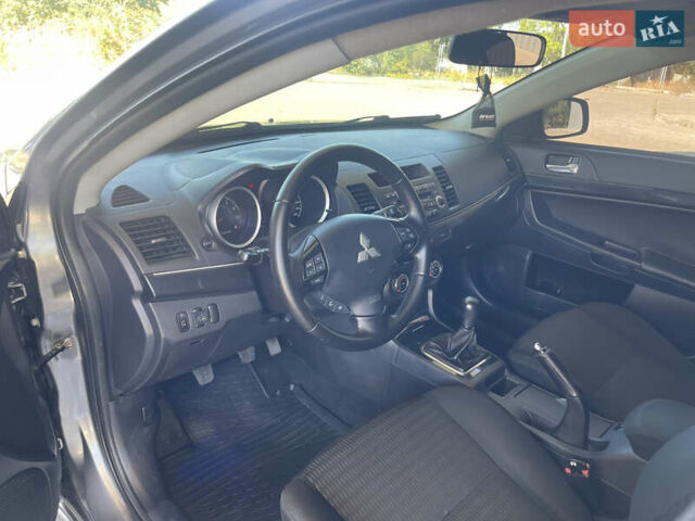 Серый Мицубиси Лансер, объемом двигателя 1.6 л и пробегом 183 тыс. км за 7400 $, фото 9 на Automoto.ua