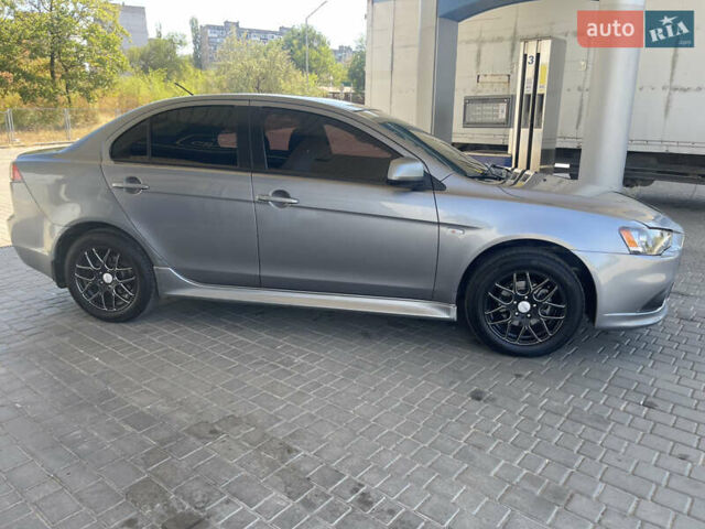 Серый Мицубиси Лансер, объемом двигателя 1.6 л и пробегом 183 тыс. км за 7400 $, фото 1 на Automoto.ua