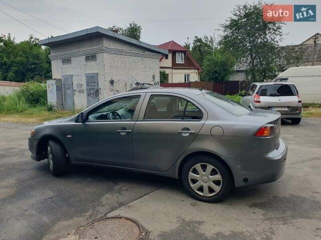 Серый Мицубиси Лансер, объемом двигателя 1.59 л и пробегом 265 тыс. км за 5950 $, фото 3 на Automoto.ua