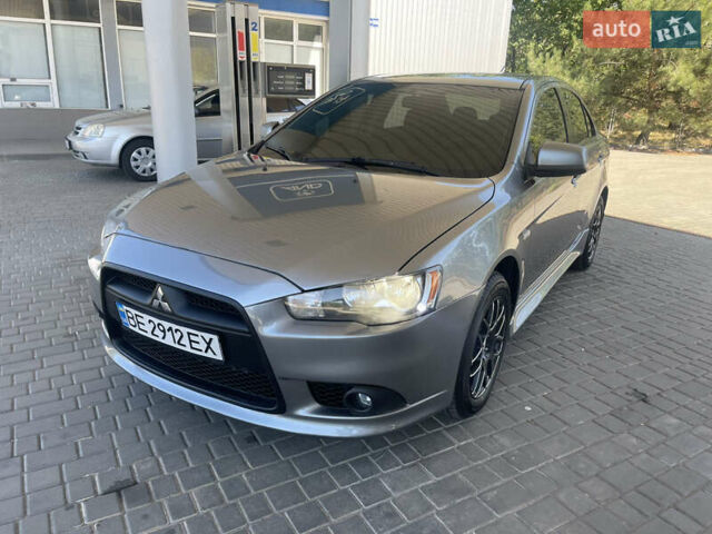Серый Мицубиси Лансер, объемом двигателя 1.6 л и пробегом 183 тыс. км за 7400 $, фото 7 на Automoto.ua