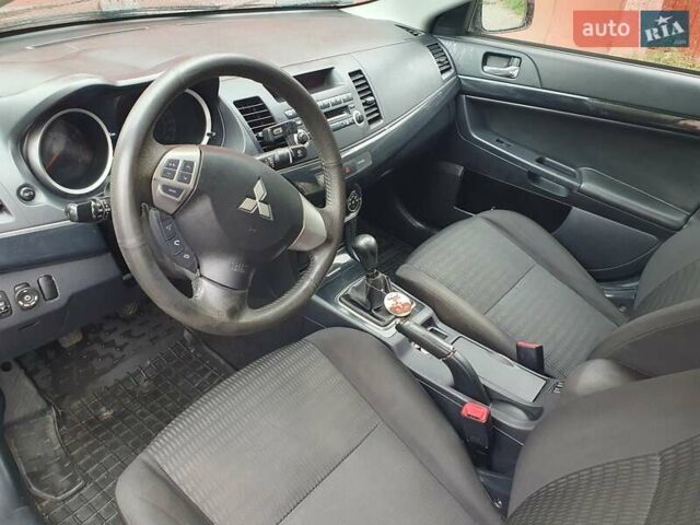 Серый Мицубиси Лансер, объемом двигателя 1.59 л и пробегом 265 тыс. км за 5950 $, фото 11 на Automoto.ua