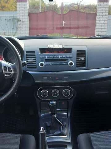 Мицубиси Лансер 2012 в Кривом Озере на Automoto.ua Серый Мицубиси Лансер, объемом двигателя 2 л и пробегом 58 тыс. км за 9500 $, фото 8 на Automoto.ua