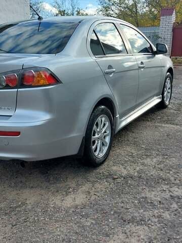 Мицубиси Лансер 2012 в Кривом Озере на Automoto.ua Серый Мицубиси Лансер, объемом двигателя 2 л и пробегом 58 тыс. км за 9500 $, фото 3 на Automoto.ua