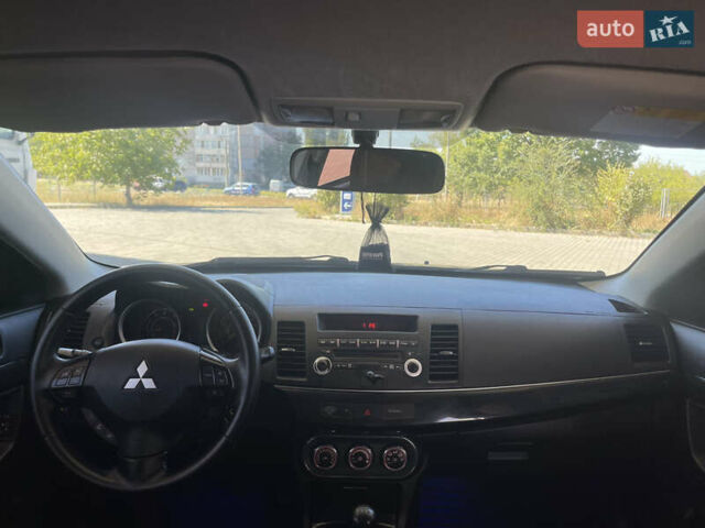 Серый Мицубиси Лансер, объемом двигателя 1.6 л и пробегом 183 тыс. км за 7400 $, фото 13 на Automoto.ua