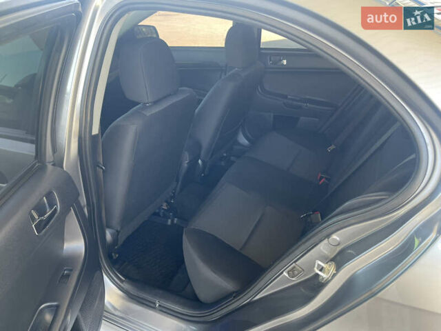 Серый Мицубиси Лансер, объемом двигателя 1.6 л и пробегом 183 тыс. км за 7400 $, фото 10 на Automoto.ua