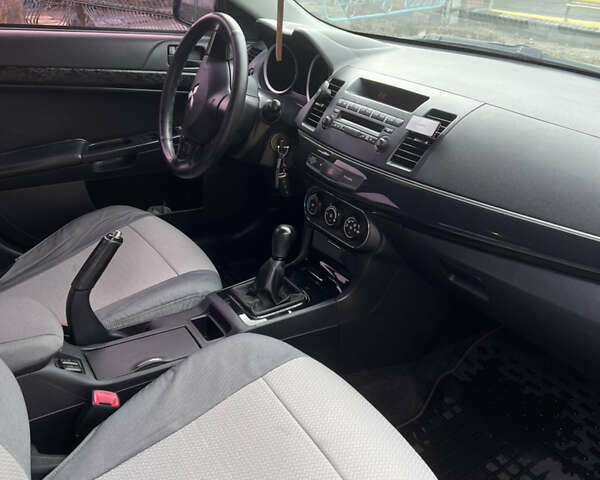 Сірий Міцубісі Lancer, об'ємом двигуна 1.59 л та пробігом 270 тис. км за 5500 $, фото 6 на Automoto.ua