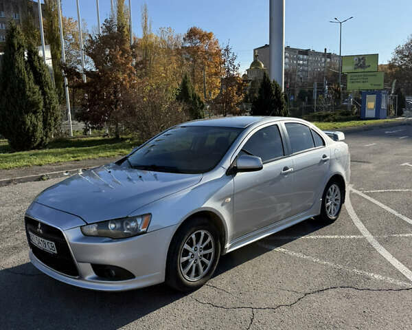 Серый Мицубиси Лансер, объемом двигателя 1.6 л и пробегом 188 тыс. км за 7400 $, фото 7 на Automoto.ua