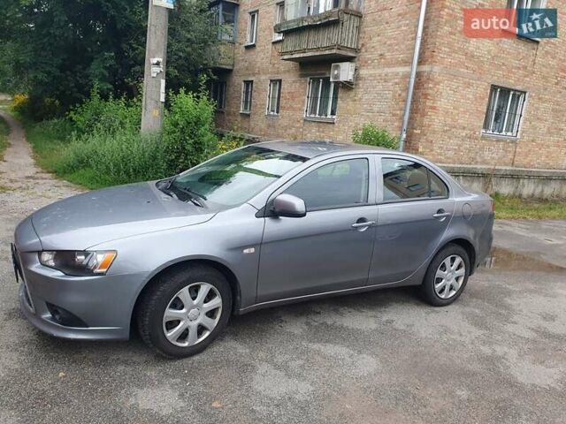 Серый Мицубиси Лансер, объемом двигателя 1.59 л и пробегом 265 тыс. км за 5950 $, фото 1 на Automoto.ua
