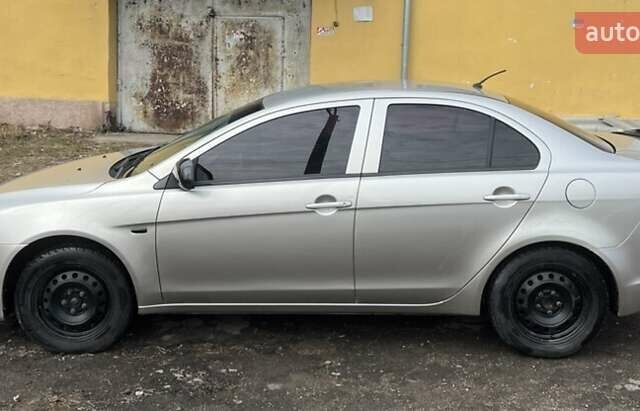 Сірий Міцубісі Lancer, об'ємом двигуна 1.59 л та пробігом 270 тис. км за 5500 $, фото 4 на Automoto.ua