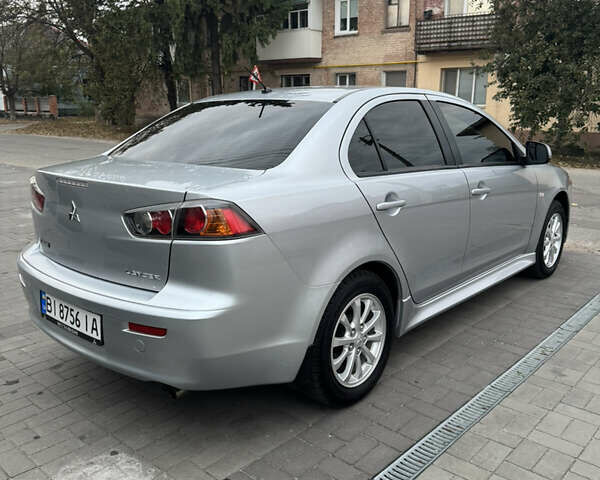 Сірий Міцубісі Lancer, об'ємом двигуна 1.6 л та пробігом 86 тис. км за 7400 $, фото 4 на Automoto.ua