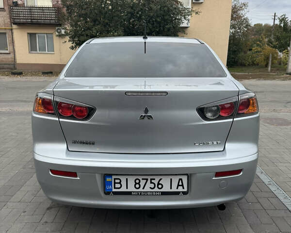 Сірий Міцубісі Lancer, об'ємом двигуна 1.6 л та пробігом 86 тис. км за 7400 $, фото 5 на Automoto.ua