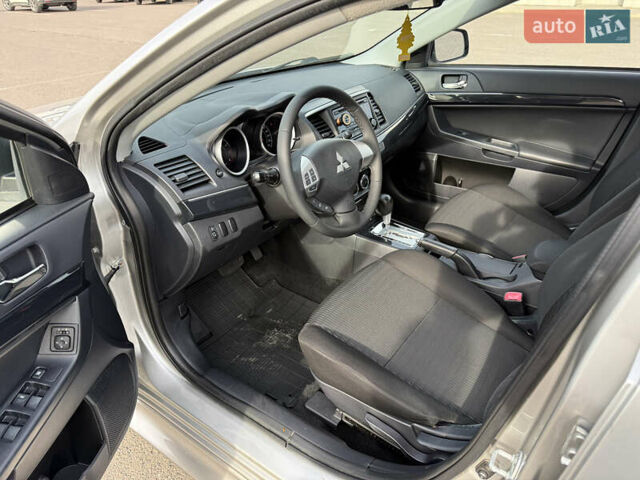 Сірий Міцубісі Lancer, об'ємом двигуна 1.6 л та пробігом 205 тис. км за 7900 $, фото 8 на Automoto.ua