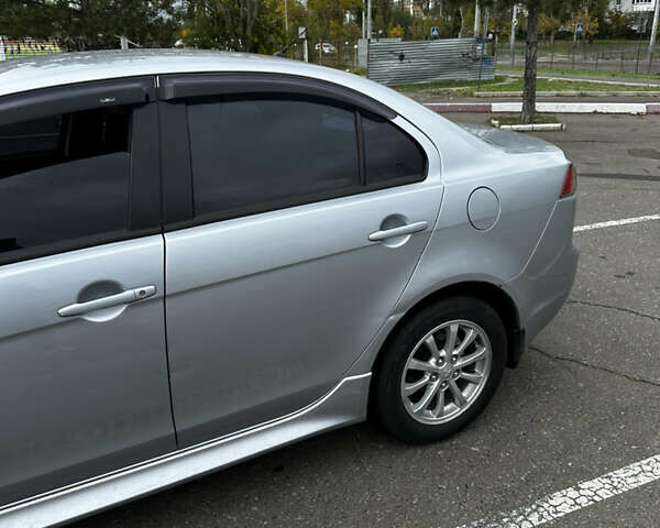 Сірий Міцубісі Lancer, об'ємом двигуна 1.6 л та пробігом 32 тис. км за 8500 $, фото 7 на Automoto.ua