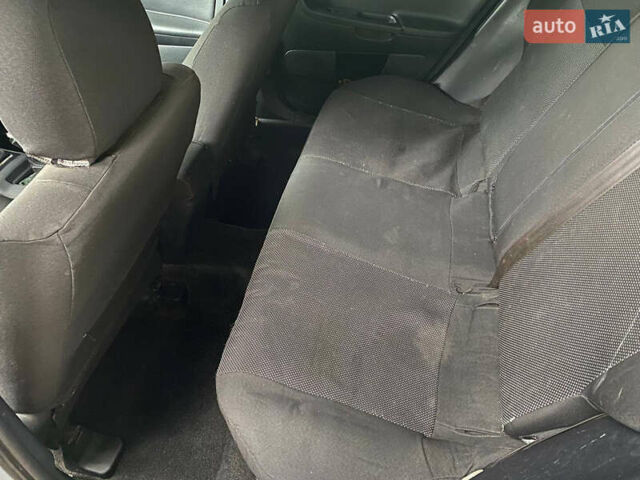 Сірий Міцубісі Lancer, об'ємом двигуна 1.6 л та пробігом 240 тис. км за 7000 $, фото 16 на Automoto.ua