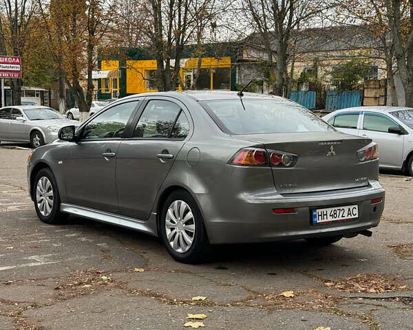 Серый Мицубиси Лансер, объемом двигателя 2 л и пробегом 170 тыс. км за 7400 $, фото 12 на Automoto.ua