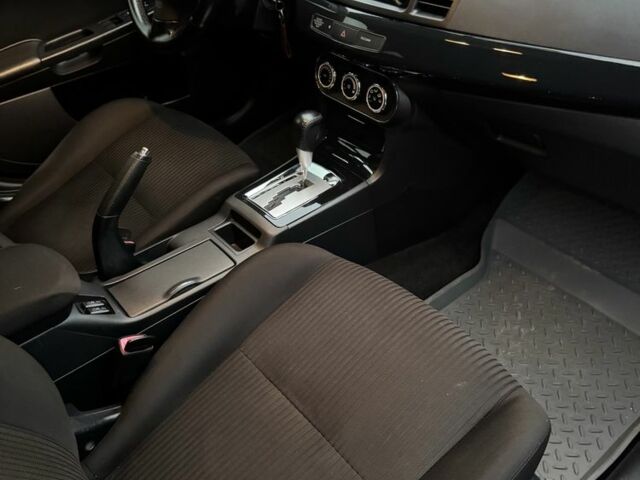 Серый Мицубиси Лансер, объемом двигателя 1.6 л и пробегом 85 тыс. км за 7400 $, фото 12 на Automoto.ua