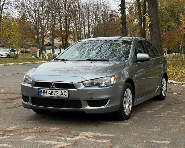 Серый Мицубиси Лансер, объемом двигателя 2 л и пробегом 170 тыс. км за 7400 $, фото 11 на Automoto.ua