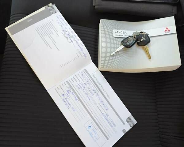 Серый Мицубиси Лансер, объемом двигателя 1.59 л и пробегом 128 тыс. км за 9000 $, фото 27 на Automoto.ua