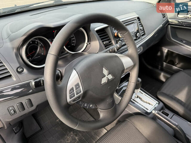 Сірий Міцубісі Lancer, об'ємом двигуна 1.6 л та пробігом 205 тис. км за 7900 $, фото 10 на Automoto.ua