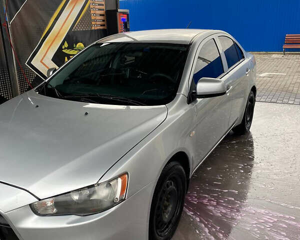 Сірий Міцубісі Lancer, об'ємом двигуна 1.6 л та пробігом 240 тис. км за 7000 $, фото 1 на Automoto.ua