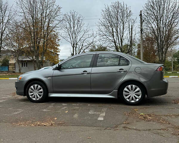 Серый Мицубиси Лансер, объемом двигателя 2 л и пробегом 170 тыс. км за 7400 $, фото 2 на Automoto.ua