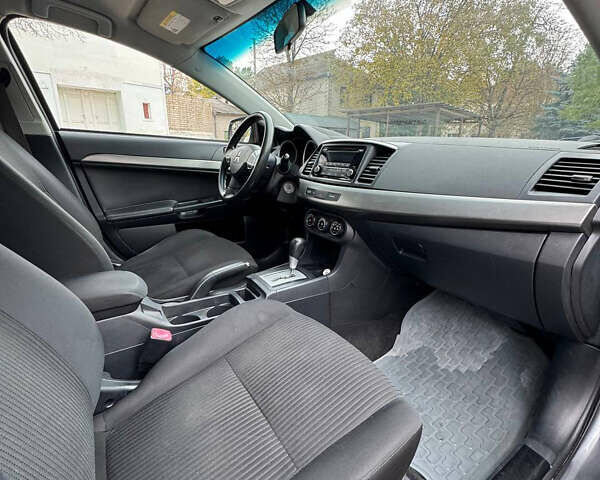 Серый Мицубиси Лансер, объемом двигателя 2 л и пробегом 170 тыс. км за 7400 $, фото 15 на Automoto.ua