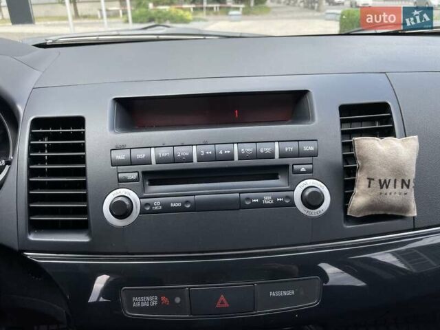 Сірий Міцубісі Lancer, об'ємом двигуна 2.4 л та пробігом 208 тис. км за 8250 $, фото 14 на Automoto.ua