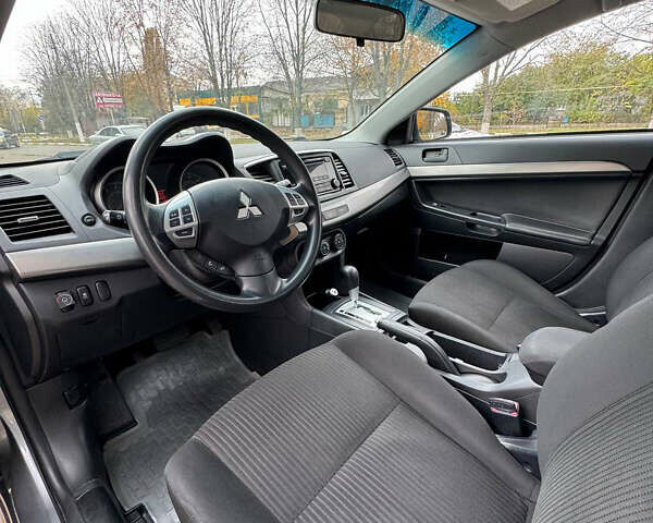 Серый Мицубиси Лансер, объемом двигателя 2 л и пробегом 170 тыс. км за 7400 $, фото 18 на Automoto.ua