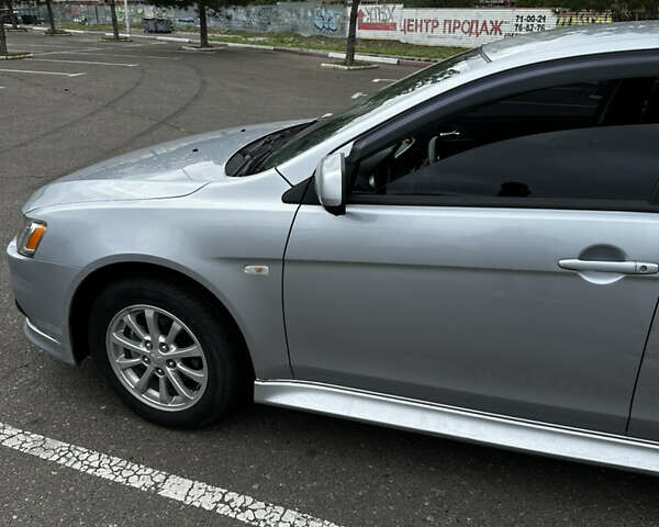 Сірий Міцубісі Lancer, об'ємом двигуна 1.6 л та пробігом 32 тис. км за 8500 $, фото 6 на Automoto.ua