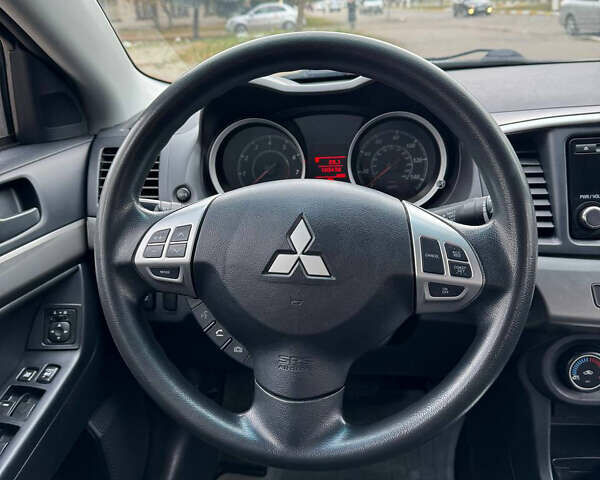 Серый Мицубиси Лансер, объемом двигателя 2 л и пробегом 170 тыс. км за 7400 $, фото 16 на Automoto.ua