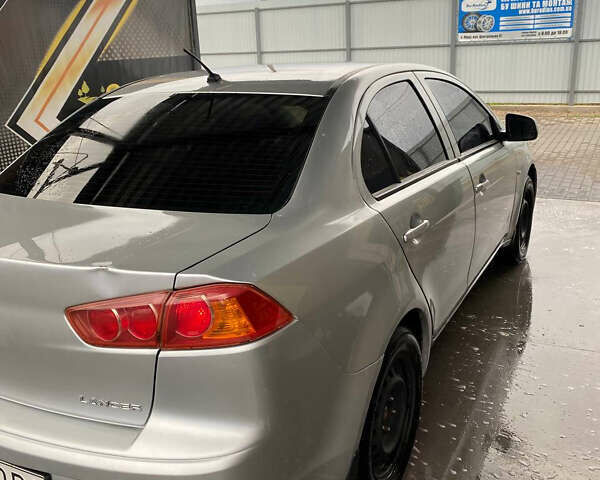 Сірий Міцубісі Lancer, об'ємом двигуна 1.6 л та пробігом 240 тис. км за 7000 $, фото 3 на Automoto.ua