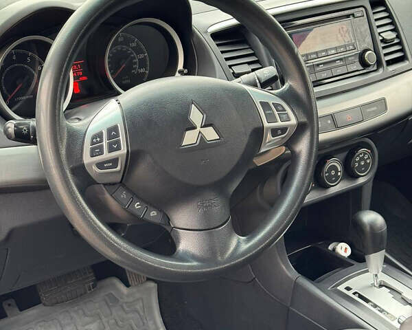 Серый Мицубиси Лансер, объемом двигателя 2 л и пробегом 170 тыс. км за 7400 $, фото 22 на Automoto.ua