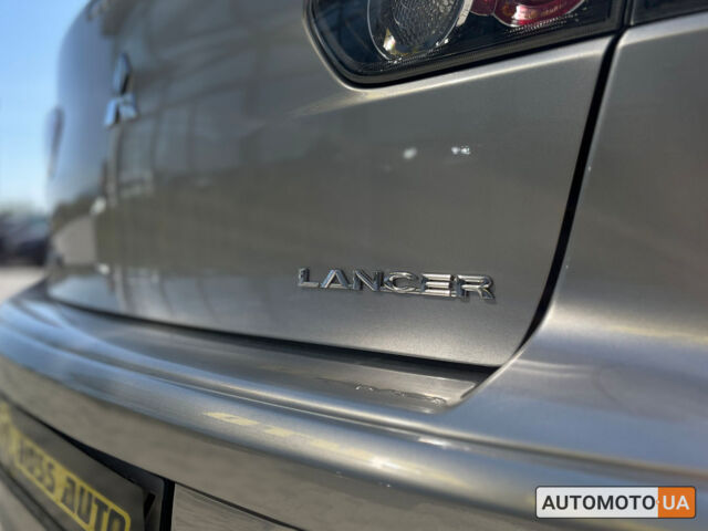 Сірий Міцубісі Lancer, об'ємом двигуна 1.6 л та пробігом 93 тис. км за 9700 $, фото 9 на Automoto.ua