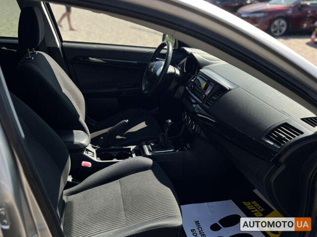 Сірий Міцубісі Lancer, об'ємом двигуна 1.6 л та пробігом 93 тис. км за 9700 $, фото 21 на Automoto.ua