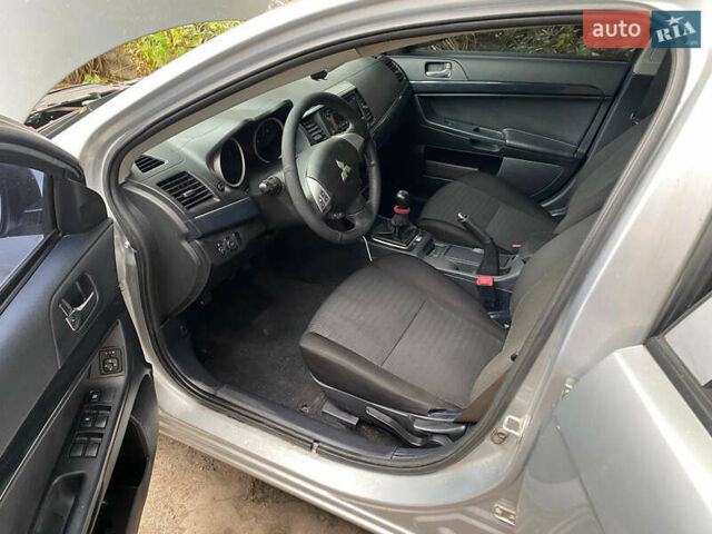 Сірий Міцубісі Lancer, об'ємом двигуна 1.6 л та пробігом 240 тис. км за 7000 $, фото 15 на Automoto.ua