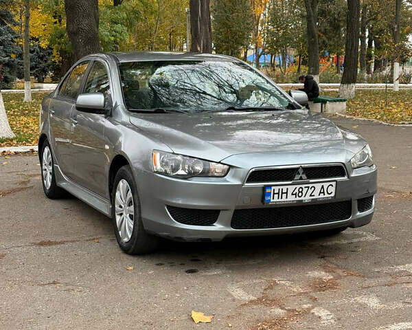 Серый Мицубиси Лансер, объемом двигателя 2 л и пробегом 170 тыс. км за 7400 $, фото 9 на Automoto.ua