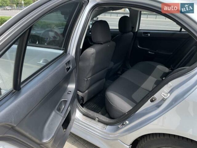 Сірий Міцубісі Lancer, об'ємом двигуна 2.4 л та пробігом 208 тис. км за 8250 $, фото 15 на Automoto.ua