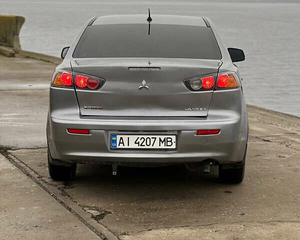 Серый Мицубиси Лансер, объемом двигателя 1.59 л и пробегом 200 тыс. км за 6900 $, фото 5 на Automoto.ua