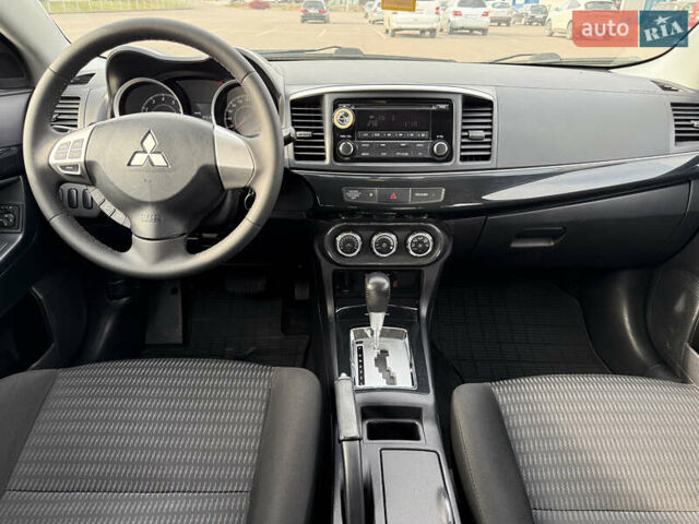 Сірий Міцубісі Lancer, об'ємом двигуна 1.6 л та пробігом 205 тис. км за 7900 $, фото 14 на Automoto.ua