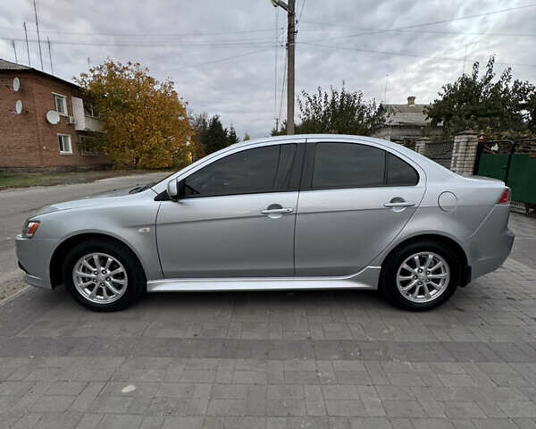Сірий Міцубісі Lancer, об'ємом двигуна 1.6 л та пробігом 86 тис. км за 7400 $, фото 7 на Automoto.ua