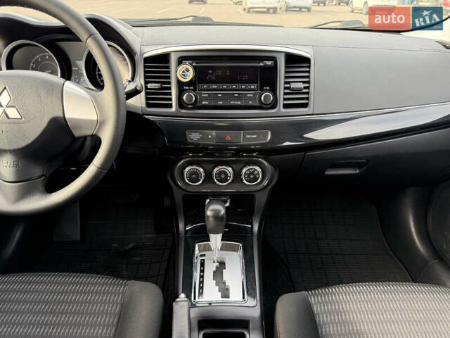 Сірий Міцубісі Lancer, об'ємом двигуна 1.6 л та пробігом 205 тис. км за 7900 $, фото 15 на Automoto.ua